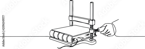 Obraz na plátně Book binding press machine with hand, continuous one line drawing of old antique