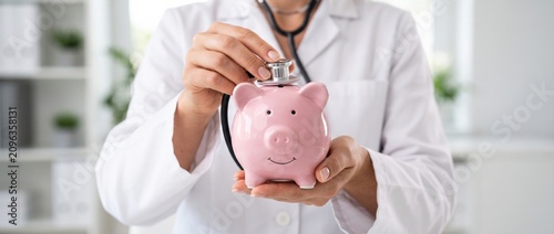 Photography A healthcare professional conducting a financial health check by using a medical