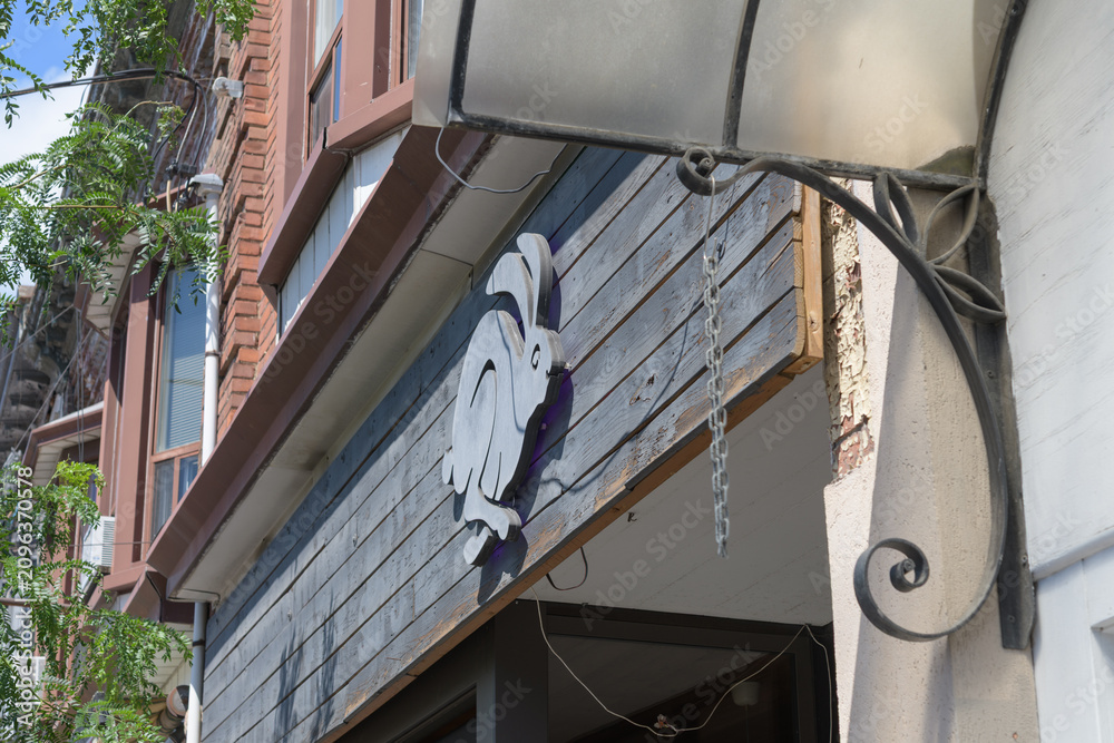 Obraz premium novelty sign outside Conejo Negro, a restaurant, located at 838 College St, Toronto
