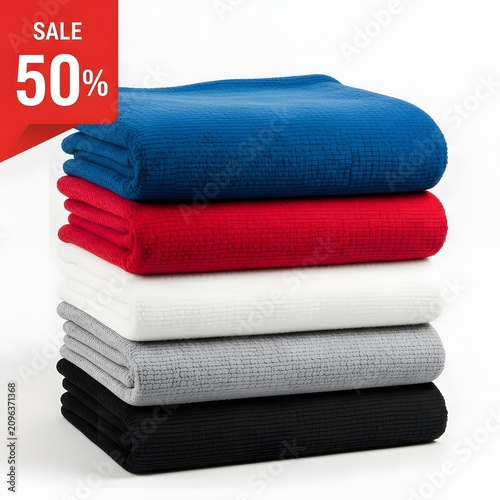 Stacked colorful towels on sale