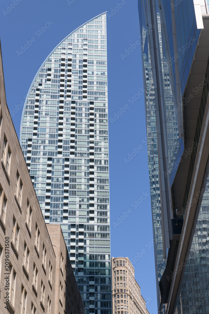 Obraz premium view of L-Tower designed by Daniel Libeskind from Bay St and lane south of the Dominion Public Building and CIBC Square, Toronto 