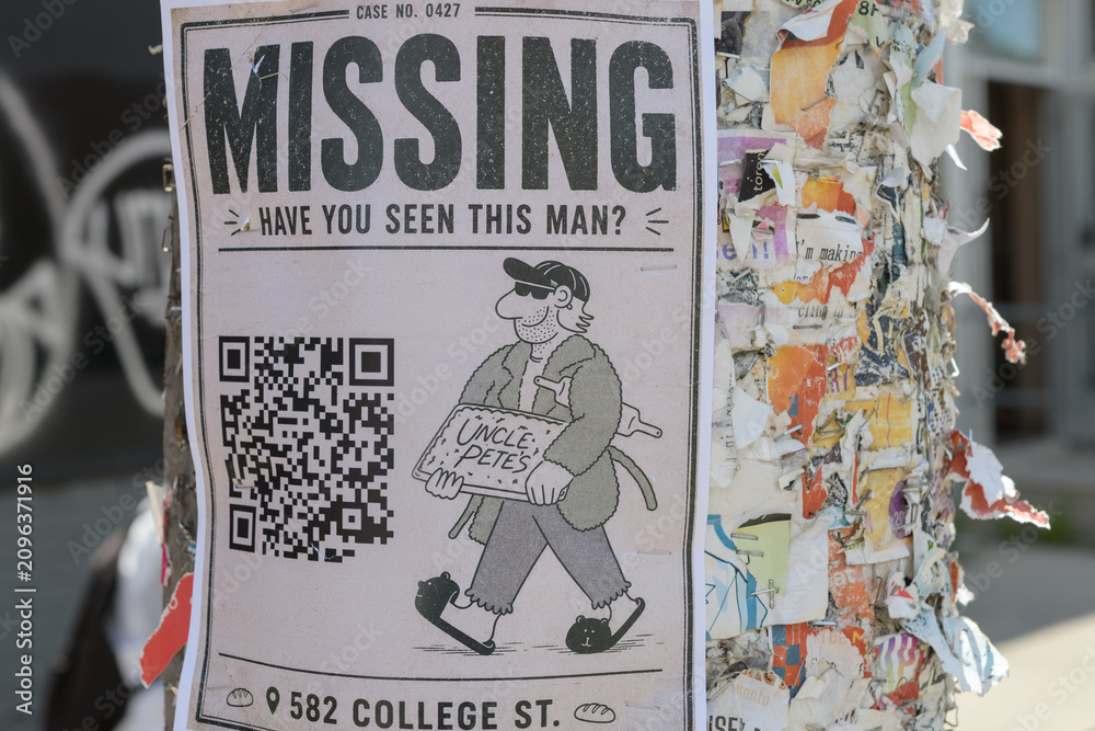 Obraz premium street poster in Toronto stapled to a well used pole outside (Missing, Uncle Pete's Bread Co, 582 College St)