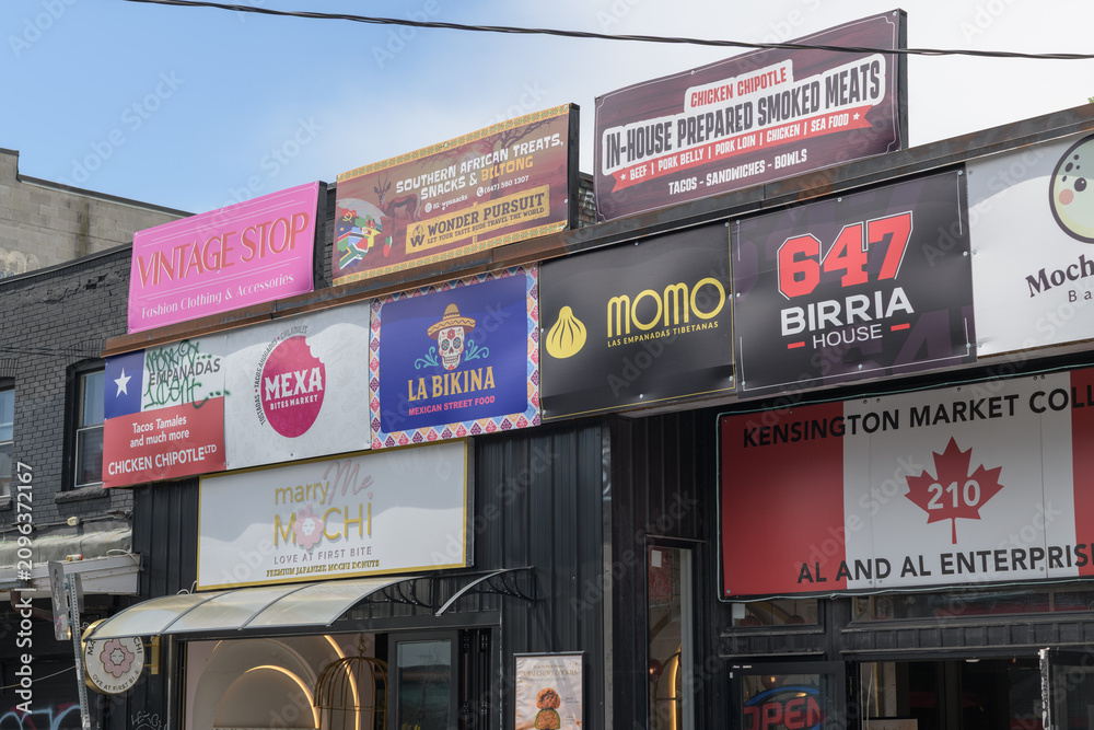 Obraz premium various signs in Kensington Market around 210 Augusta Av, Toronto