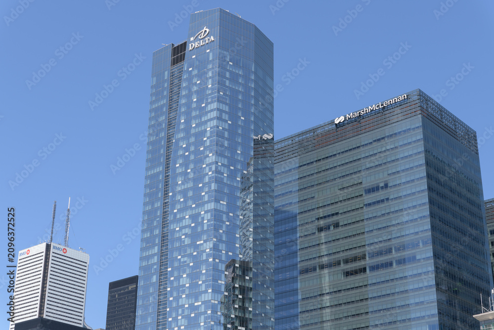 Obraz premium First Canadian Place (BMO Financial Group headquarters), Delta hotel, and office tower with Marsh McLennan sign, South Core, Toronto