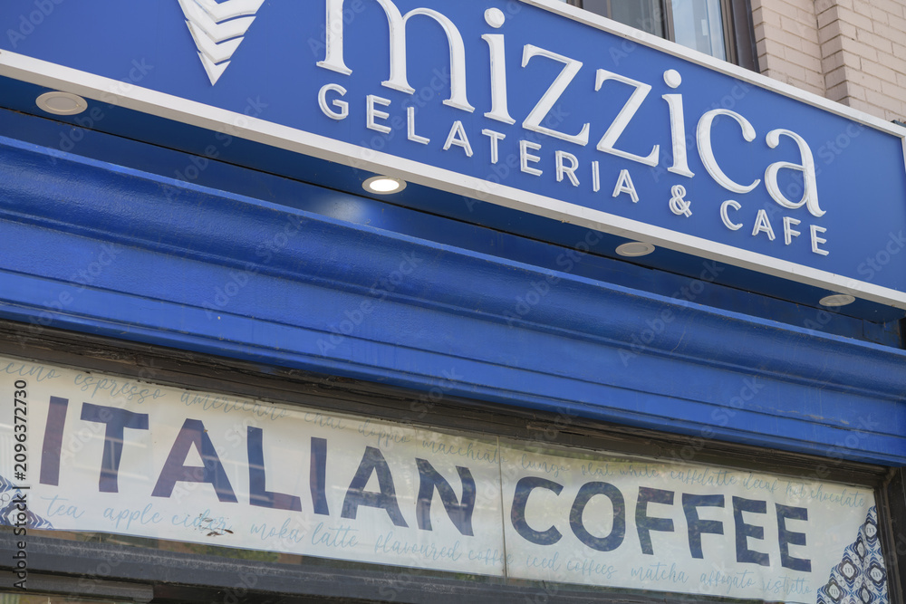Obraz premium exterior building facade and signage outside Mizzica Gelateria & Cafe, an ice cream shop, located at 307 Queen St W, Toronto