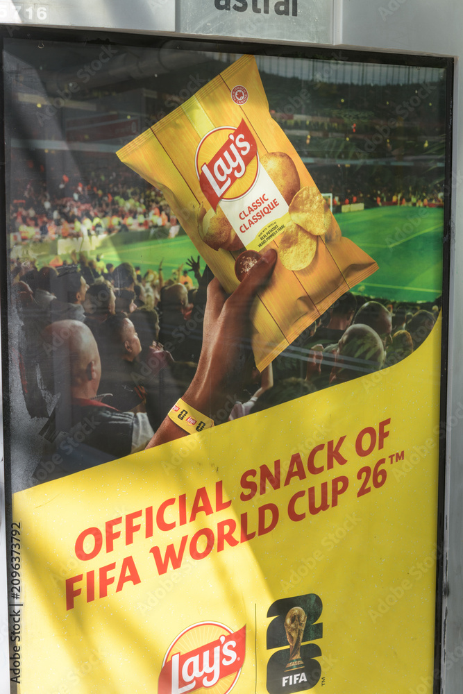 Obraz premium OOH transit stop poster with advertising for Lay's snack food (FIFA World Cup 2026) in host city Toronto