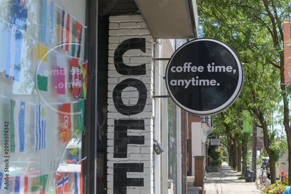 Obraz premium wall-mounted round projecting sign at The Citrus Espresso Bar located at 1104 College St, Toronto