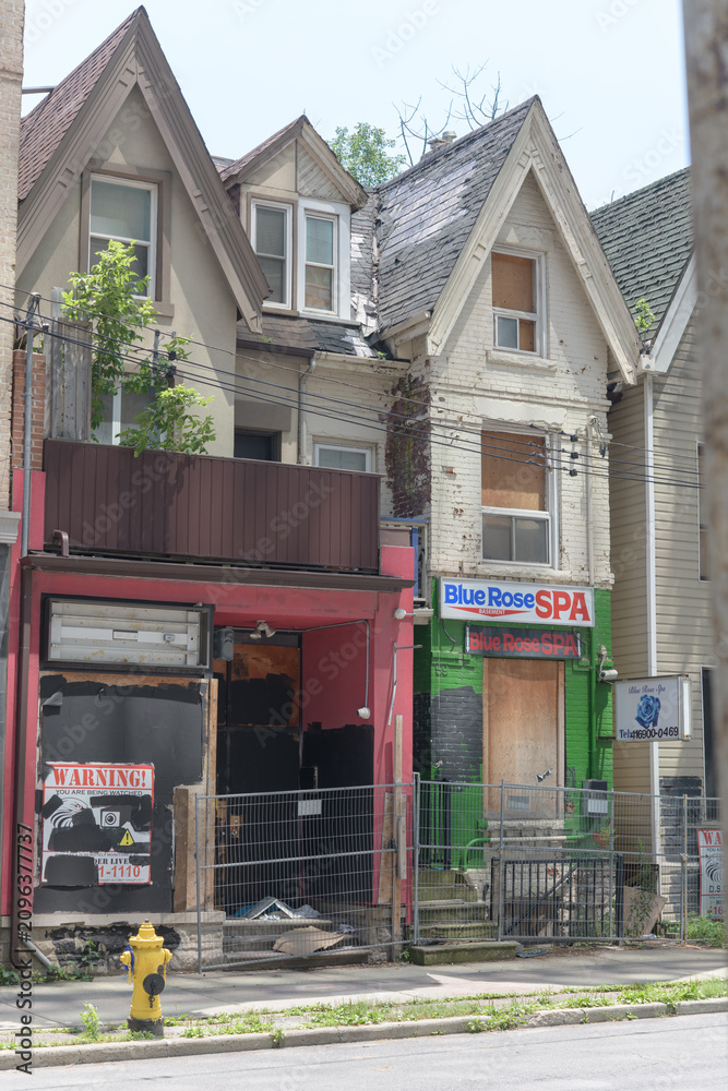 Obraz premium example of row houses designated as historic at 55-67 Elm St - former location of Blue Rose Spa, Toronto (subject to redevelopment shortly)