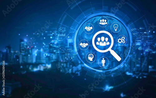 Strategic Digital Human Resources Management Concept Magnifying Glass Focuses on Talent Acquisition and Business Innovation Against a Futuristic Cityscape Background