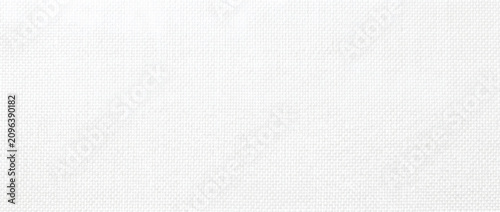 Fabric texture displays a realistic seamless white woven cotton textile surface with fine natural fibers for upholstery branding mockups and premium decorative backgrounds