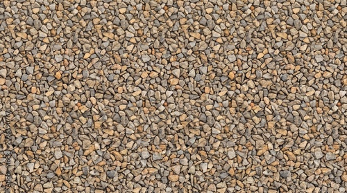Stone path texture – seamless pattern of architectural gravel floor. Aerial top view of Stone landscaping road construction material.