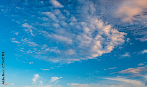 Bild auf Leinwand Beautiful vibrant blue sky with fluffy cirrocumulus and altocumulus clouds