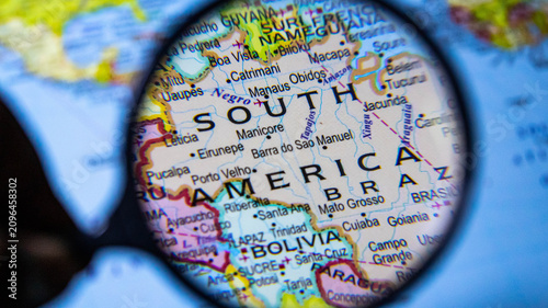 Tableau sur toile Map of South America under magnifying glass