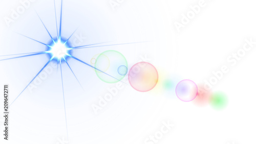 Foto Bright blue starburst with concentric circular rings and a horizontal trail of c