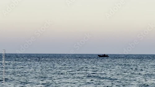 A boat sails on the sea. Cyprus Island, tourist boats, Mediterranean Sea.