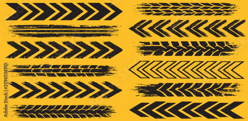 Foto Black Tire Track Arrow Brush Set for Road Warning Grunge
