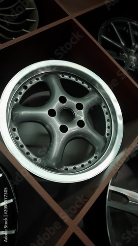 Premium alloy wheels on a car showroom shelf. Alloy wheels concept.