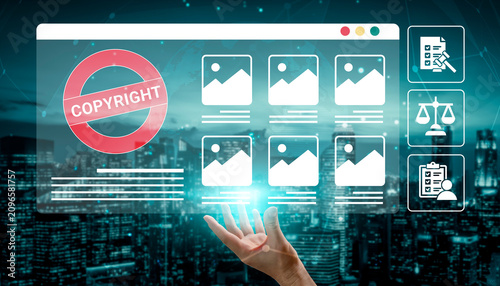 Foto A visual representation of a hand reaching towards a digital interface, highlighting copyright issues in media and the importance of image permissions in a modern city setting