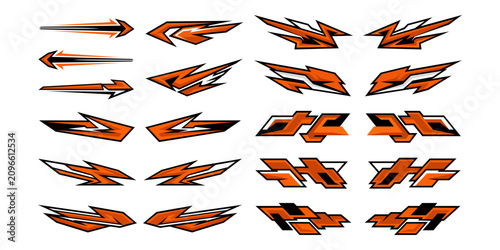 Collection of orange and black racing decals, sharp abstract speed shapes, and vehicle body wrap design elements