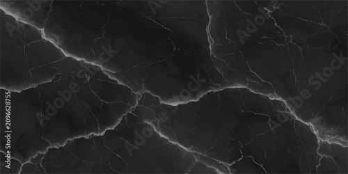 Photos Close-up of a dark, elegant marble texture with striking white veins that create a dramatic, abstract pattern