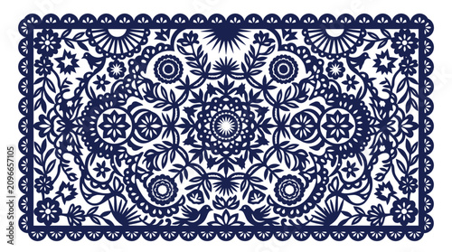 Blue ornate lace pattern on a rectangular decorative card featuring intricate symmetry and floral motifs.