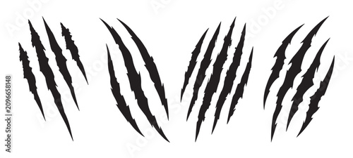 Fotografía Fierce black claw marks on white background, wild animal scratch vector