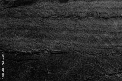 Dark grey black slate background or texture.