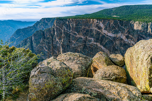 Картината върху платно Dramatic close-up of the Painted Wall's pale pegmatite dike streaks across dark schist cliff face, Black Canyon of the Gunnison NP, Colorado