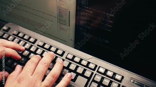 Man work with chatbot AI online, connecting with AI and using a chat bot. IT engineer software developer programmer interact with chat bot, making writing code. Typing on laptop keyboard