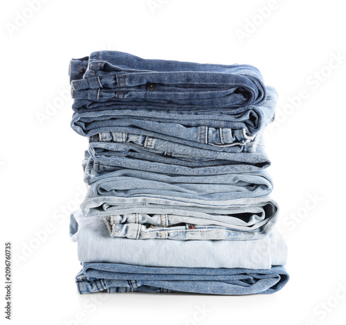 Stack of folded blue denim ...