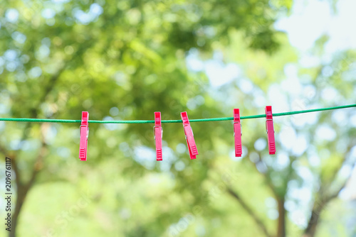 Red plastic clothespins han...