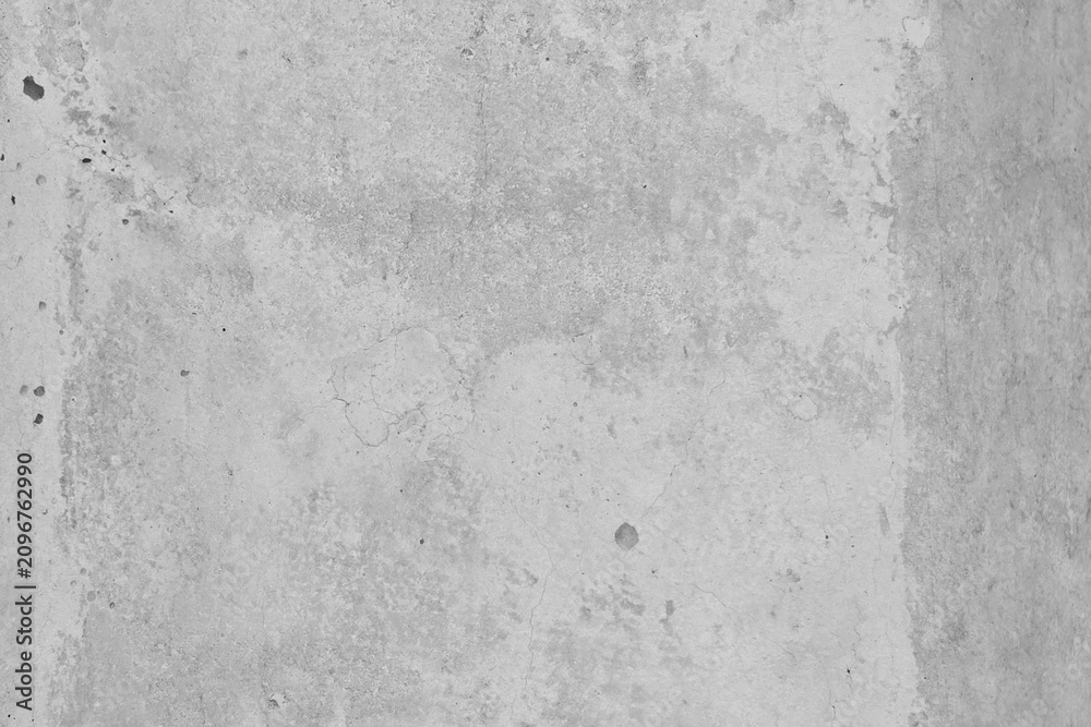 Naklejka premium Gray concrete texture background with a rough, weathered surface and subtle variations