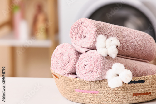 Rolled pink cotton towels w...