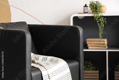 Modern black leather armcha...
