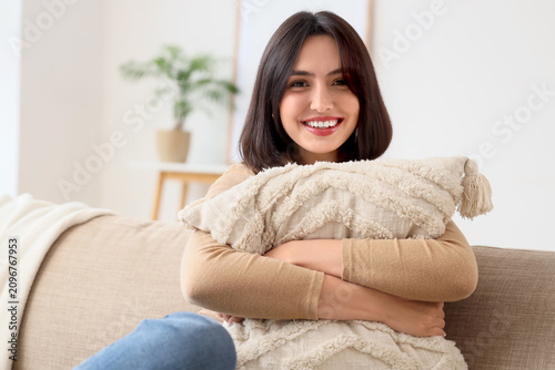 Smiling young woman relaxin...