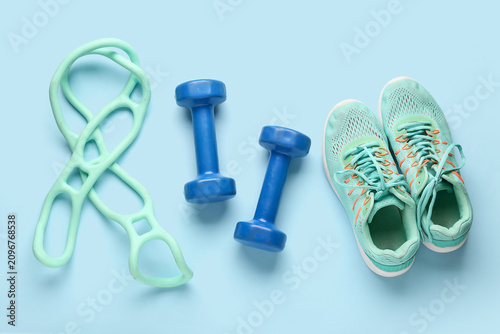 Dumbbells with shoes and sk...