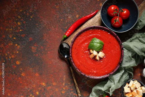 Bowl of tasty tomato soup a...