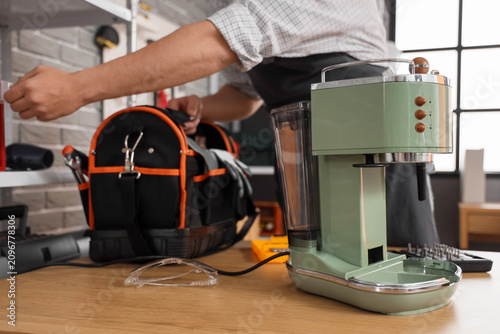 Modern coffee machine on ta...
