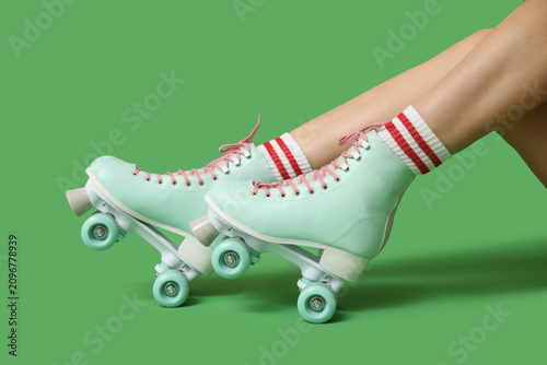 Legs of young woman in roll...