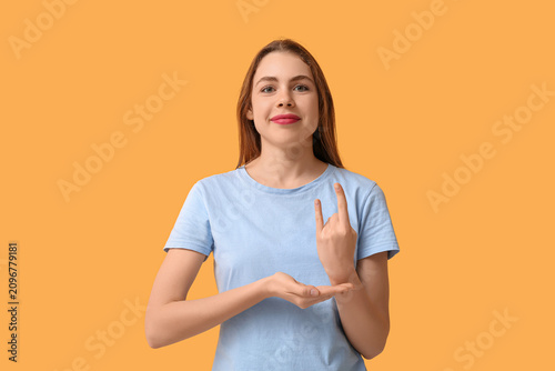 Young deaf mute woman using...