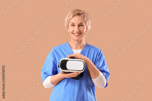 Mature female dentist with ...