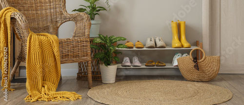 Cozy home entryway with a w...
