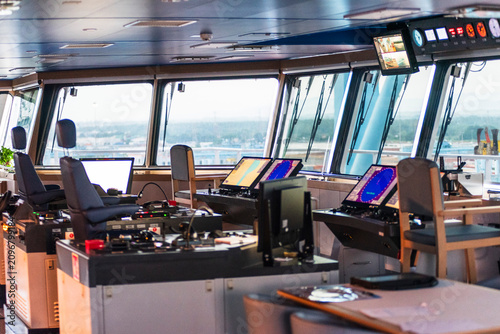 Cuadro en lienzo Modern maritime control room with radar equipment and navigation technology inside a commercial cargo vessel