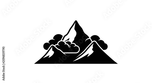 Schilderij op canvas Mountain peaks with clouds form a jagged silhouette that represents wilderness and high altitude exploration