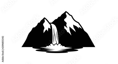 Canvastavla Waterfall cascades down from a steep mountain cliff into a pool of water in a black and white scene
