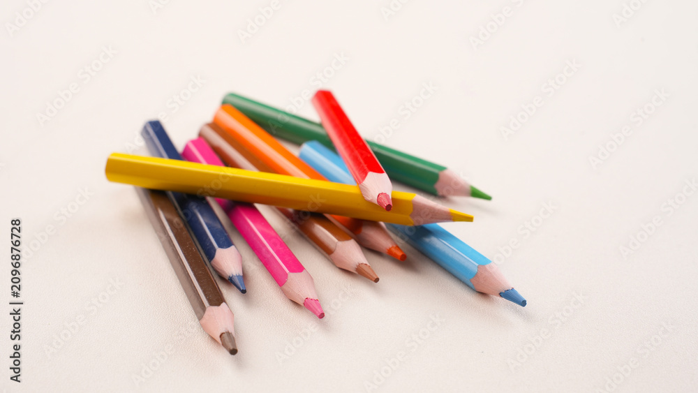 Fototapeta premium Colored sharpened wooden pencils in various colors