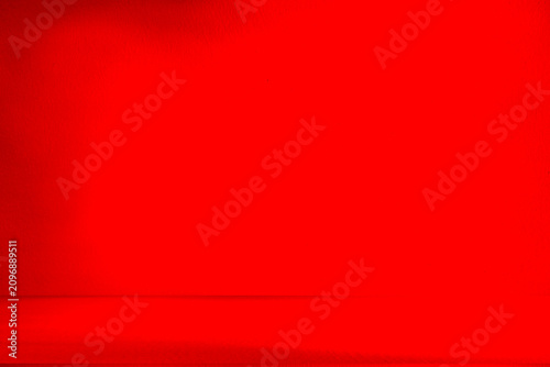 Wall interior background, studio and backdrops show products.with shadow from window color Red background for text insertion and presentation product	