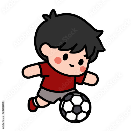 boy playing soccer