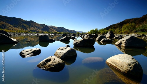Aerial view of a serene mountain lake with islands.