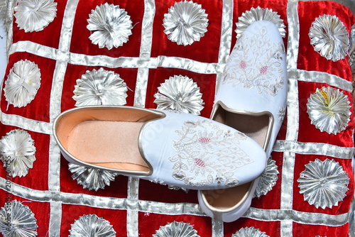Indian groom's wedding shoes close up